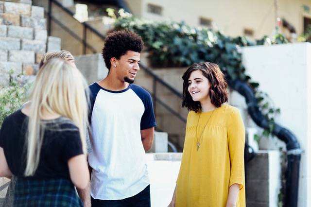 Woman in Yellow Long Sleeved Dress Standing Beside Man in White Blue Crew Neck T Shirt · Free Stock Photo (55589)