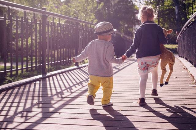 Boy and Girl Walking on Bridge during Daytime · Free Stock Photo (69877)